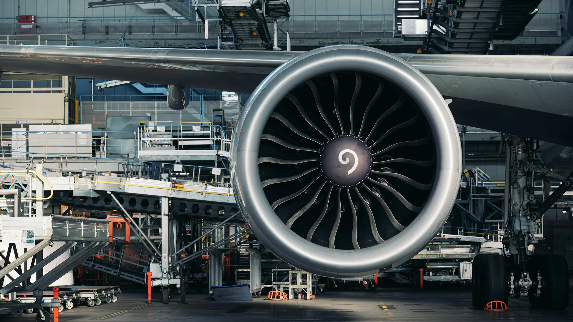 An aircraft engine under maintenance in a hangar