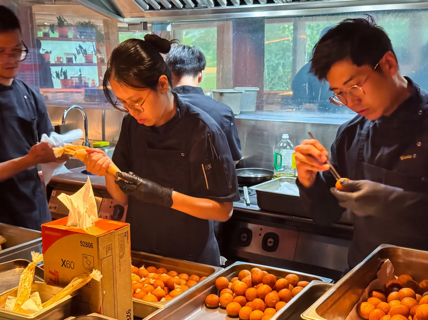 Willow’s chefs plating canapés at an off-site event